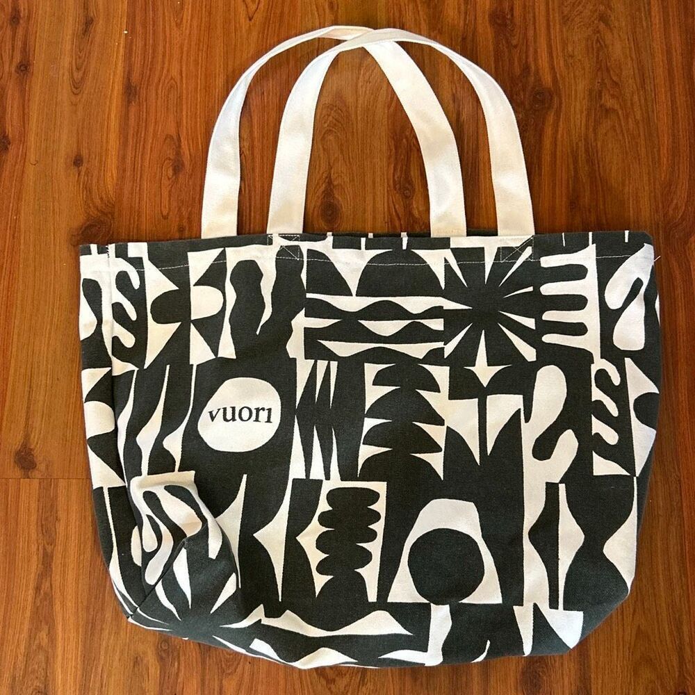 Vuori limited edition canvas tote bag with a custom print by Chicago-based artis